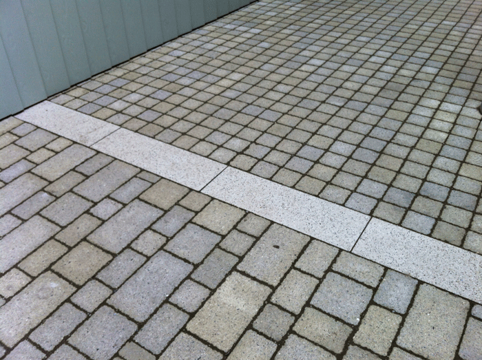 Provision of a high quality environment using  low cost recycled pavers with attention to detail