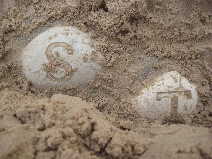 Sand digging areas with found objects